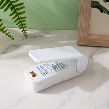 Mini Sealing Machine Small Household Plastic Sealing Machine Snacks Moisture-proof Sealing Artifact Portable Pressure Plastic
